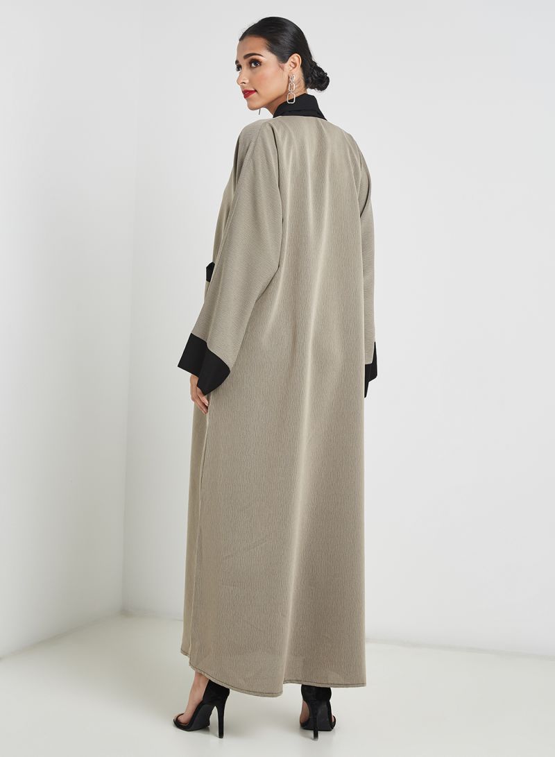 Button abaya