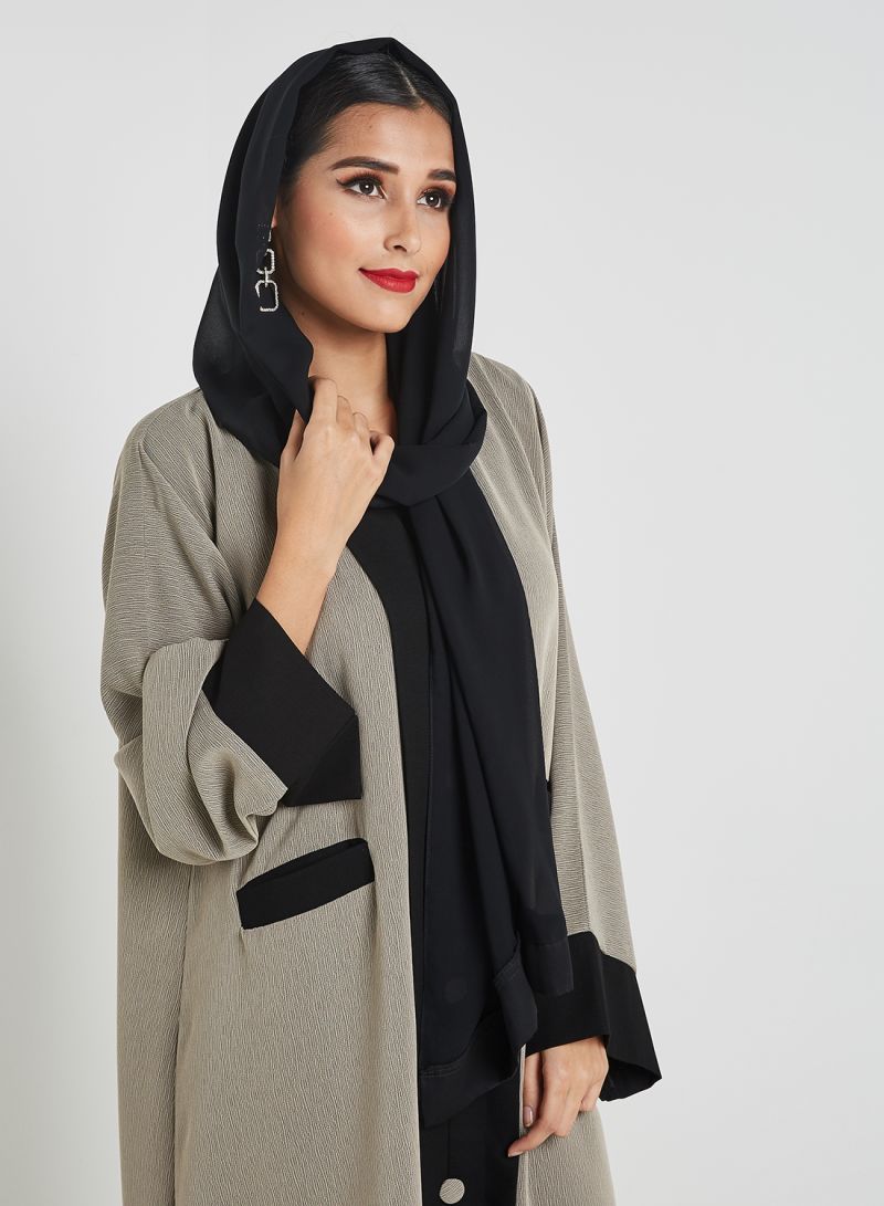 Button abaya