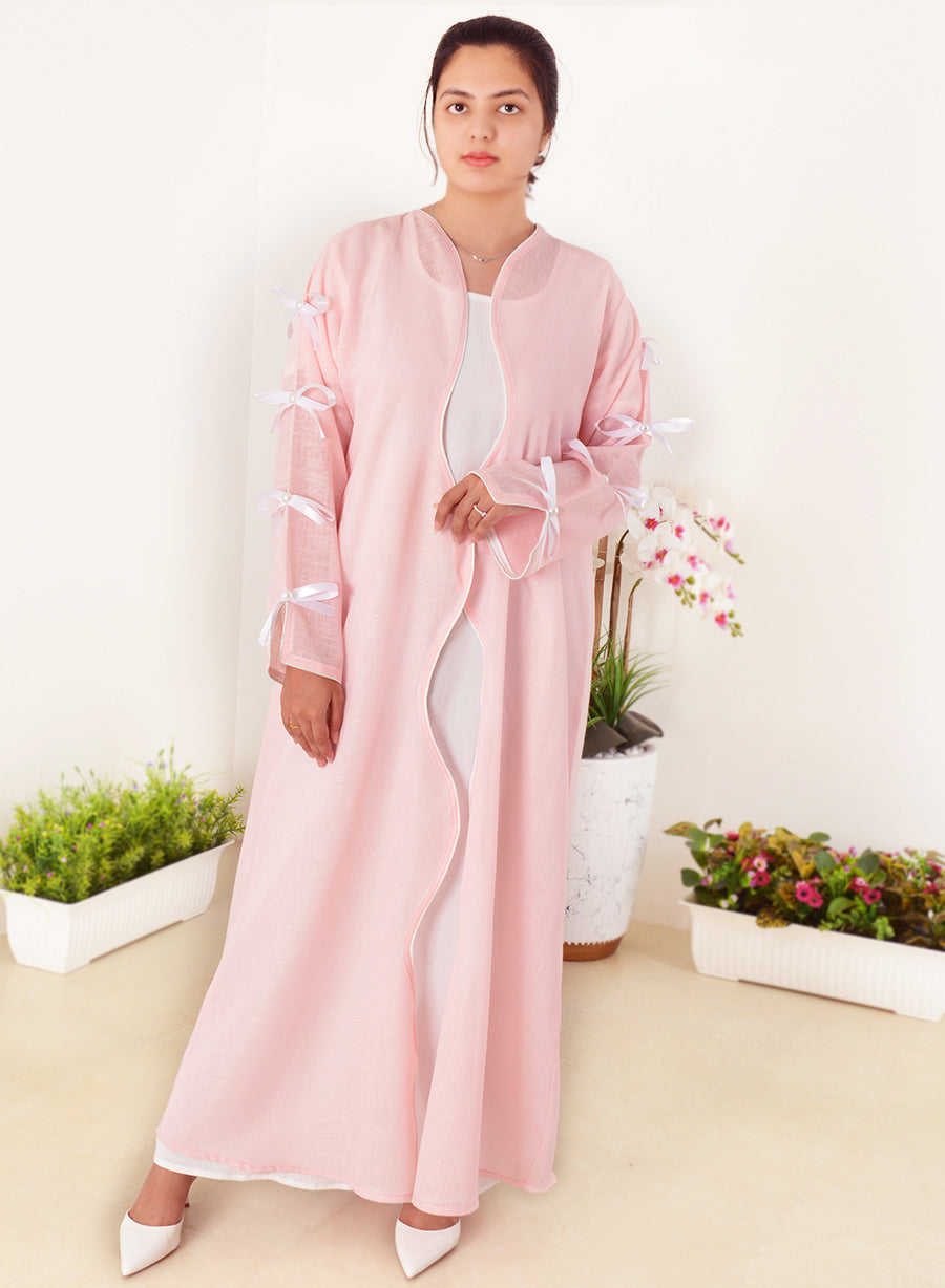 Indulge in Luxury with Our Pink Collection: A Pearl-Embellished Ribbon Bisht Abaya | Bsi4013