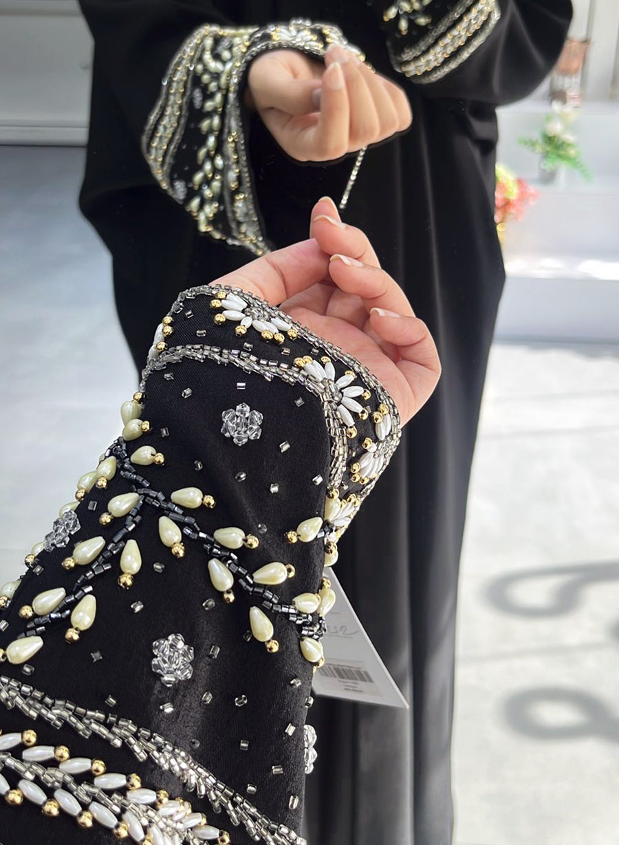 An Elite Abaya, Boasting Opulent Bead Embellishments Cascading Down The Sleeves | Bsi4046