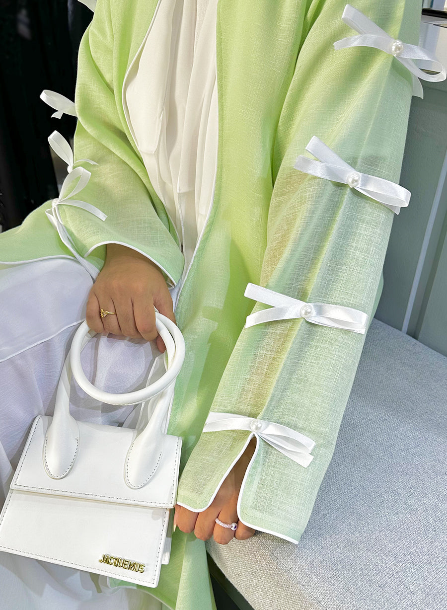 Indulge in Luxury with Our Green Collection: A Pearl-Embellished Ribbon Bisht Abaya | Bsi4047