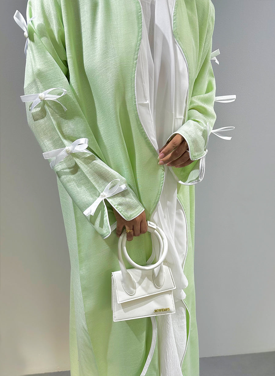 Indulge in Luxury with Our Green Collection: A Pearl-Embellished Ribbon Bisht Abaya | Bsi4047