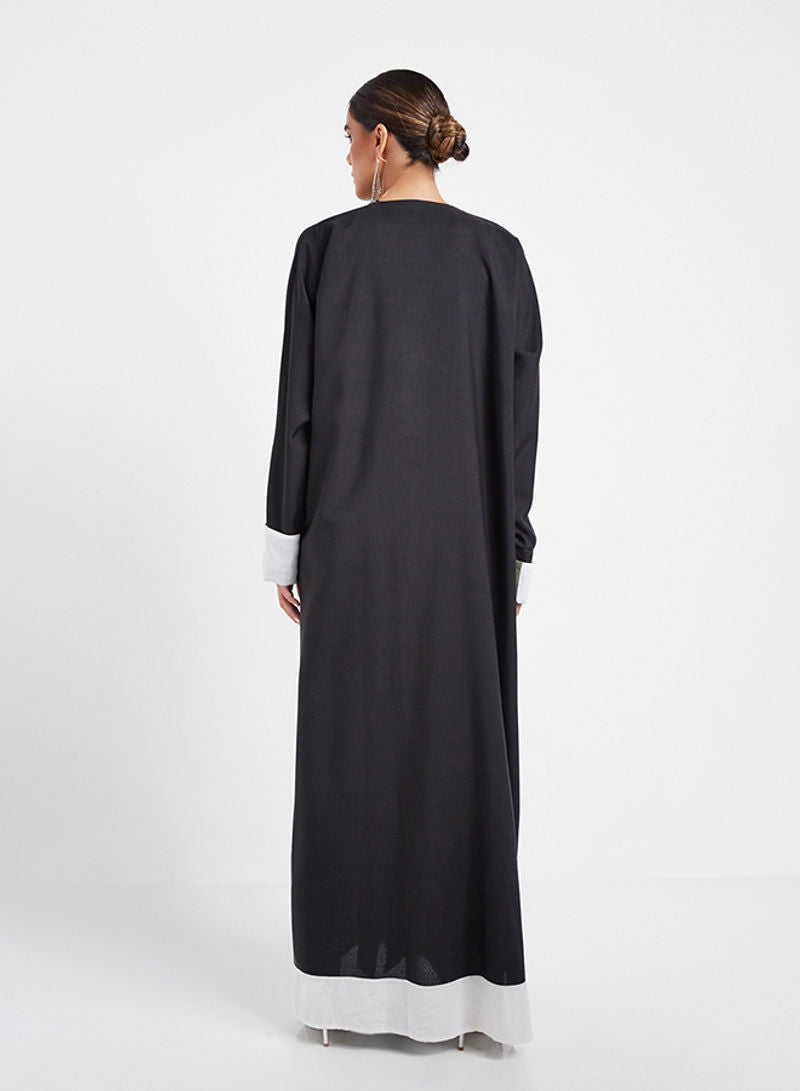 Button abaya