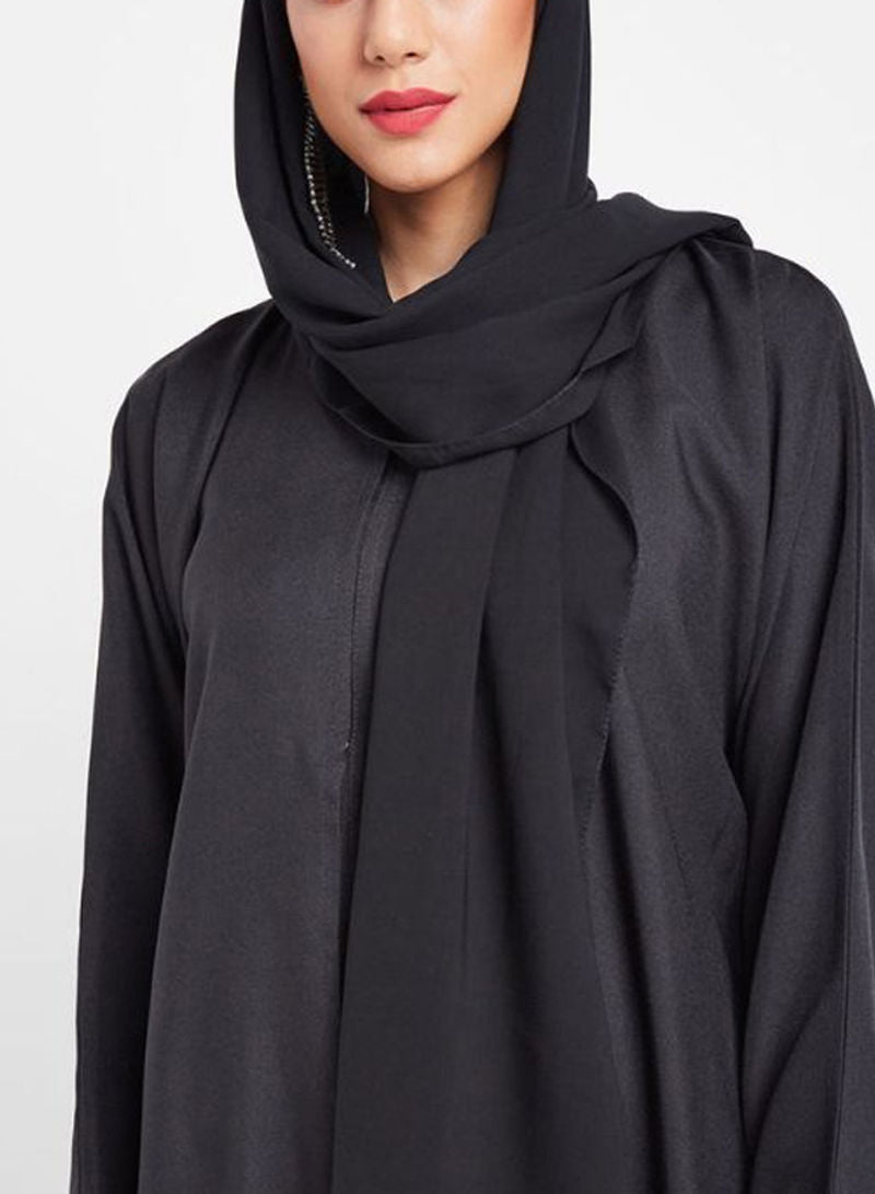 Button abaya