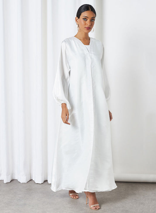 white flowy abaya